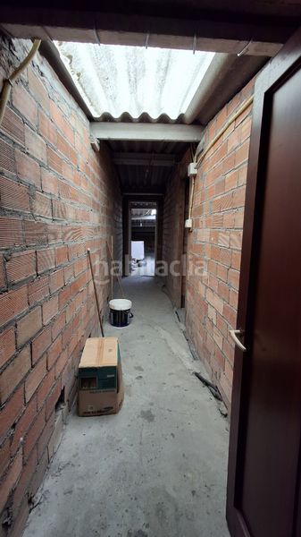 Foto 1c303ac7-f453-4280-8e8a-7e8a4d96a230. Edifici a urbanización escarabote 154 a Boiro