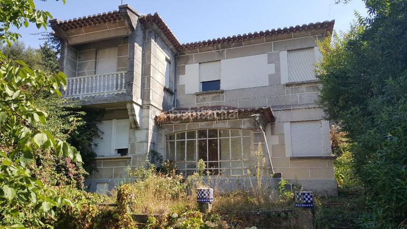 Foto 1bae6e3c-f755-469a-bbb3-8e8bfc4353f5. Chalet in O Castro Vigo