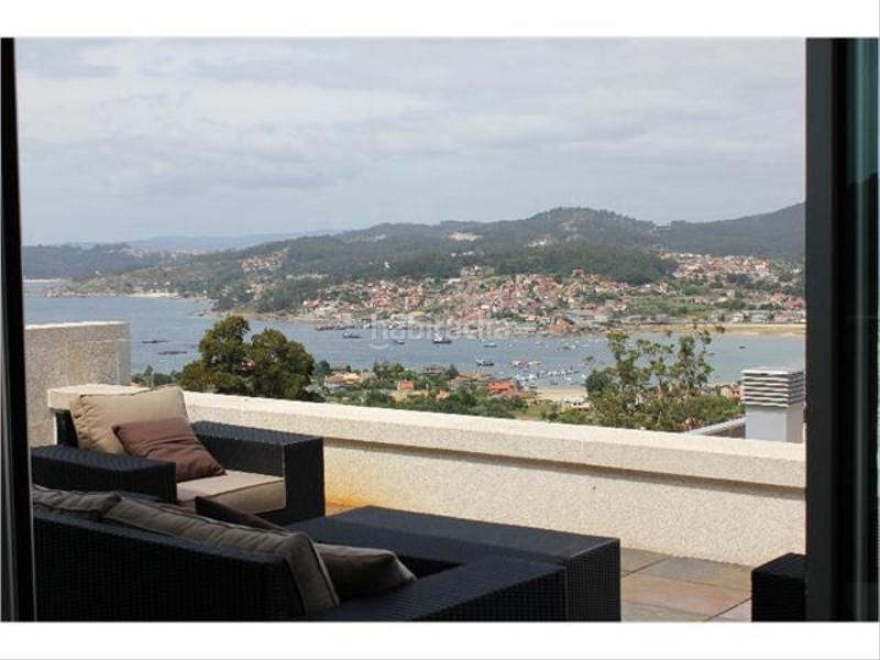 Foto c4ec3324-ad74-49d6-b424-48e10a2b3c3f. Chalet avec chauffage parking piscine dans O Hío Cangas