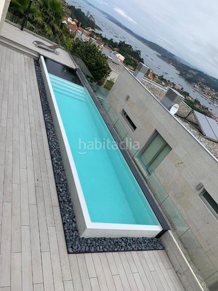 Foto 326ba805-a3b0-44b2-9ba9-dbc165e48728. Xalet amb calefacció aparcament piscina a O Hío Cangas