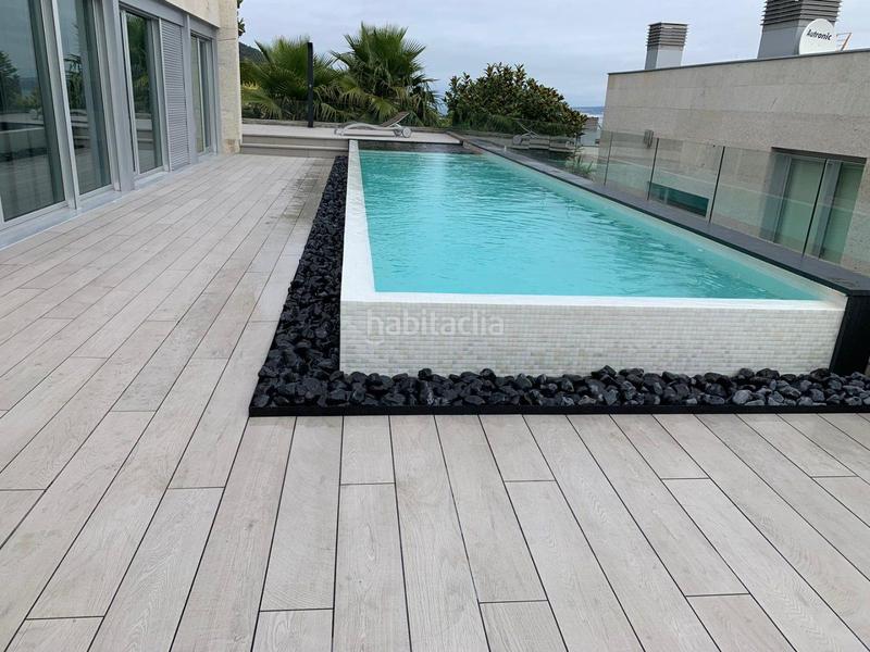 Foto ec49c427-6a61-49a3-8815-8daf19d422ff. Xalet amb calefacció aparcament piscina a O Hío Cangas