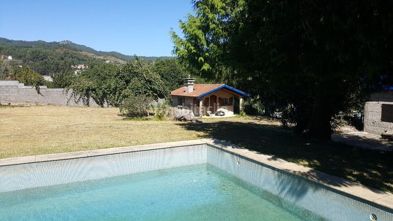 Foto bac2d11c-c57e-451f-8487-ff019c05e9f1. Casale con riscaldamento parcheggio piscina in Panxón Nigrán