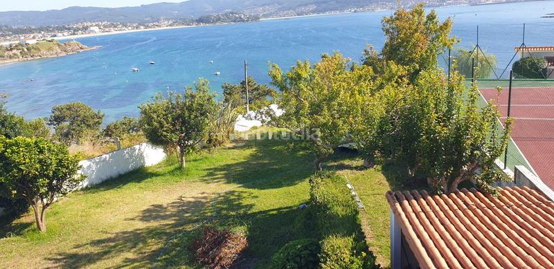 Foto 07fa3e45-a9ea-47c4-8361-a834c5dbe3d1. Chalet avec cheminée dans Panxón Nigrán