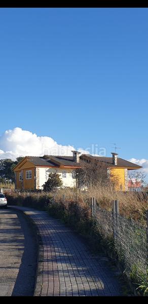 Foto 132fd306-d188-4d5c-ac60-18a1ccb0b10e. Chalet con camino in Panxón Nigrán