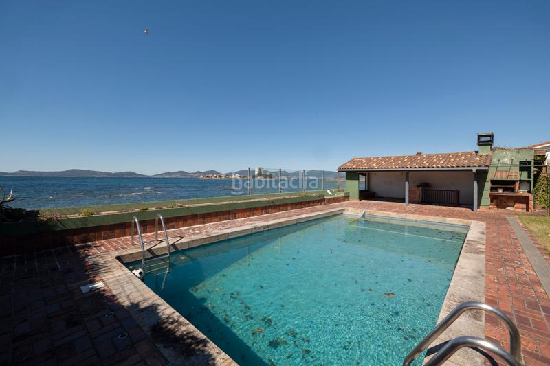 Foto 23aa662c-455f-475e-b596-f9f4556b5696. Chalet avec cheminée chauffage parking piscine dans Vigo