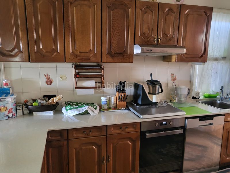 Foto fe7d81f4-d625-47a8-a6f5-a317f2c78844. Casa amb xemeneia calefacció a Alcabre Vigo