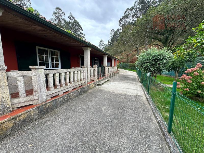 Foto 5a342473-fd40-41a4-9ce7-9209f693f444. Xalet amb calefacció aparcament piscina a Aldán Cangas