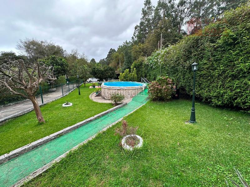 Foto 5f68488b-c39c-4e32-a51c-57344c4263f1. Xalet amb calefacció aparcament piscina a Aldán Cangas