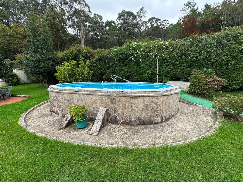 Foto 5f8ccd53-4293-48b9-ac36-9367fea30c5e. Xalet amb calefacció aparcament piscina a Aldán Cangas