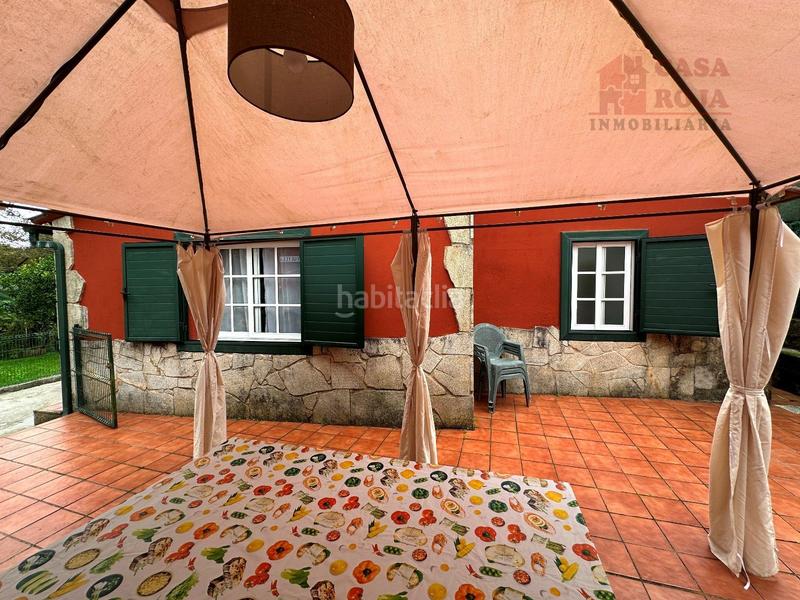 Foto db264ab2-d86b-467b-b750-12611b5e8c9f. Xalet amb calefacció aparcament piscina a Aldán Cangas