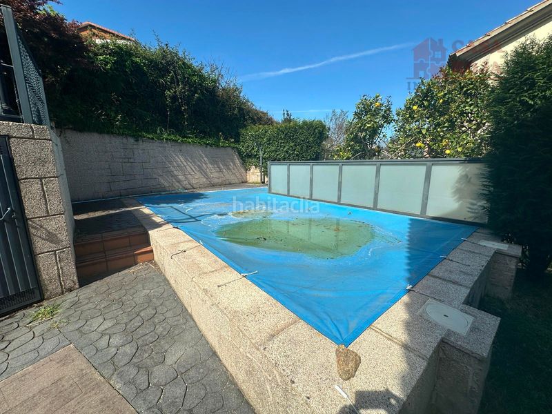 Foto 11c9fba5-d3f4-4e86-86c0-016d19a4d5aa. Chalet avec chauffage parking piscine dans O Hío Cangas