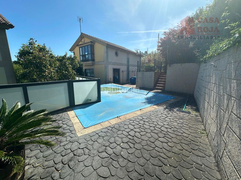 Foto 143d6a02-a9d8-43f6-a83b-57d5a654e0b5. Chalet avec chauffage parking piscine dans O Hío Cangas
