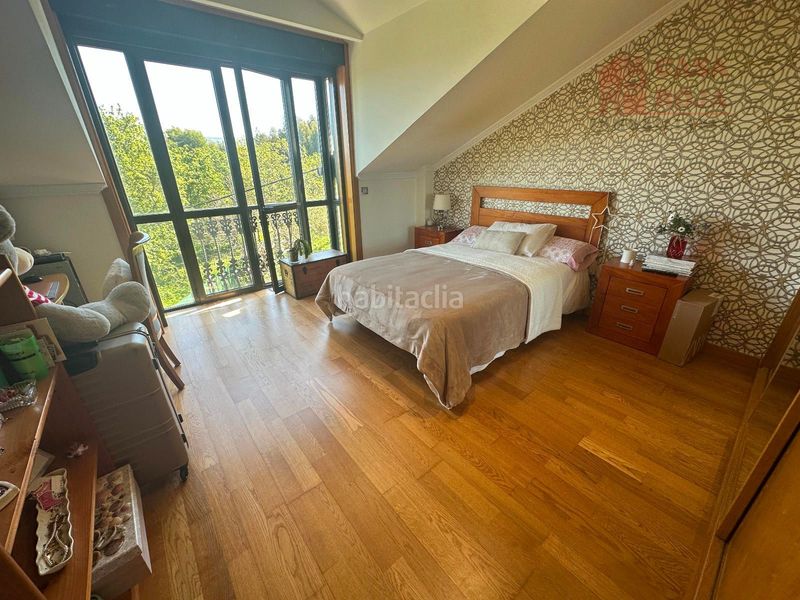Foto 6a49a2e4-2fde-49a2-a707-c9985b294ba4. Chalet avec chauffage parking piscine dans O Hío Cangas