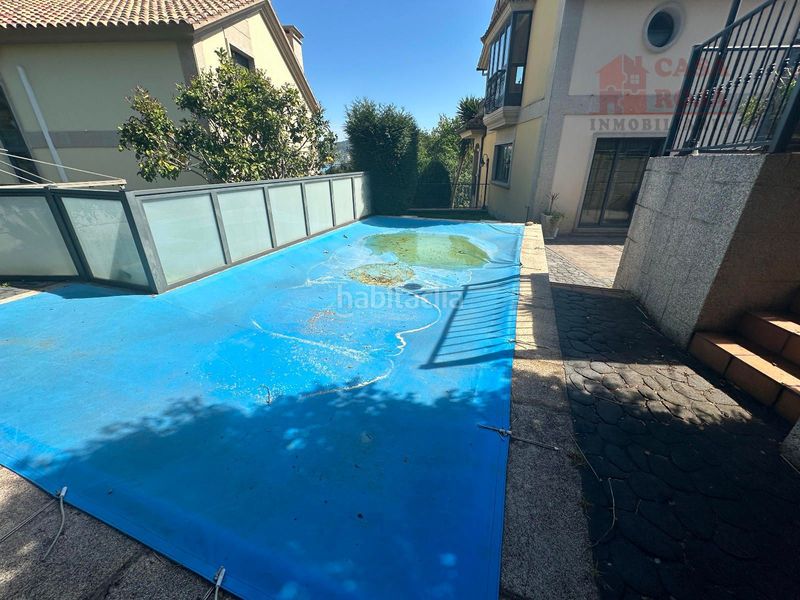 Foto e6df0149-fe48-4cb7-bab1-063fbde50e90. Chalet avec chauffage parking piscine dans O Hío Cangas