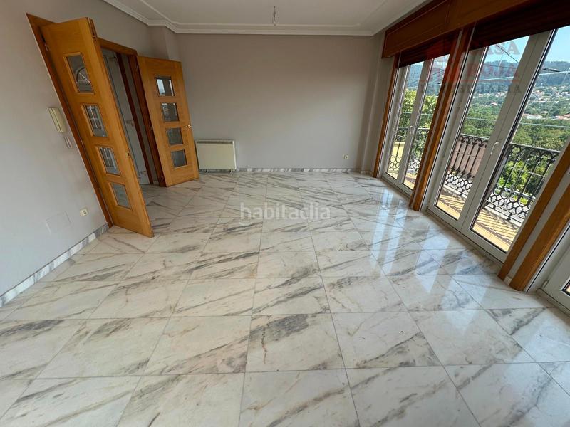 Foto aa6212cd-e83b-4686-b1e6-d72ca9524787. Chalet exclusivo chalet independiente de piedra con vistas privilegiadas a la ría de vigo. en Cangas