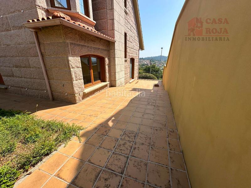 Foto c7ab1d87-4c2e-422f-9c8d-569dc298a248. Chalet exclusivo chalet independiente de piedra con vistas privilegiadas a la ría de vigo. en Cangas