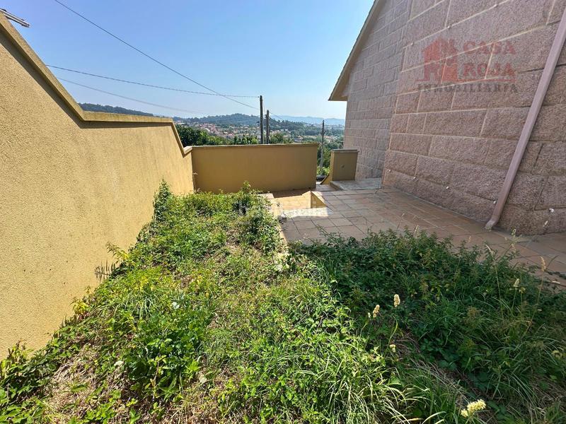 Foto c8a10211-e970-477e-989c-55148be23c55. Chalet exclusivo chalet independiente de piedra con vistas privilegiadas a la ría de vigo. en Cangas