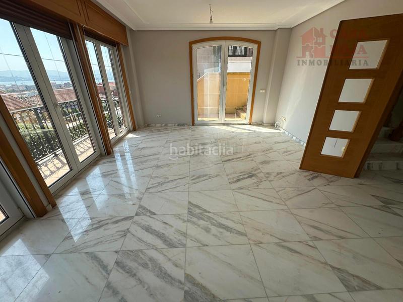 Foto da1d833c-0c71-418d-a98e-02031e790b67. Chalet exclusivo chalet independiente de piedra con vistas privilegiadas a la ría de vigo. en Cangas