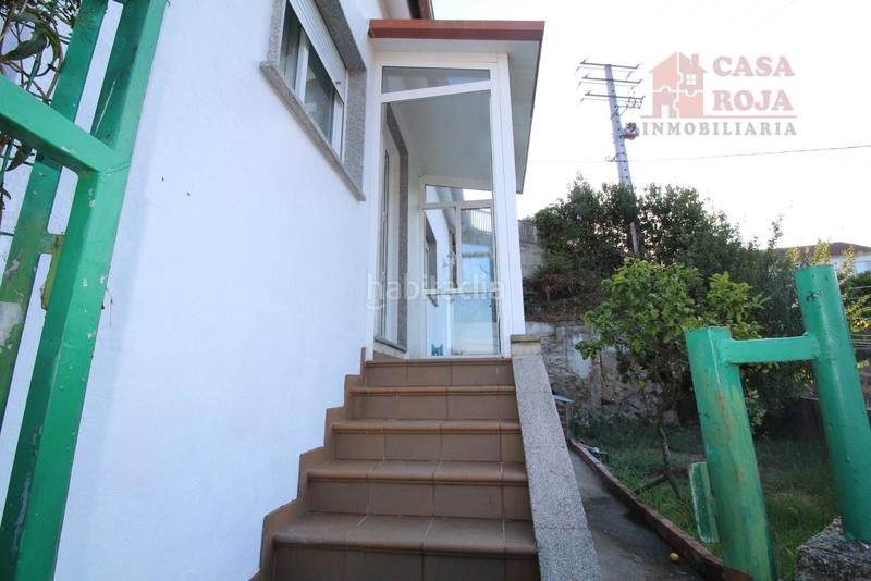 Foto fec48f57-b767-4125-a833-81bf162562c1. Casa  independiente en abelendo con finca y vistas parciales al mar. en Moaña