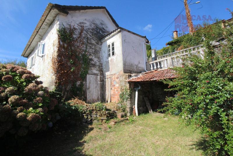 Foto 8ac2a92b-1d7d-4b03-93bc-eea44a27444a. Casa  de piedra para reformar en domayo . en Moaña