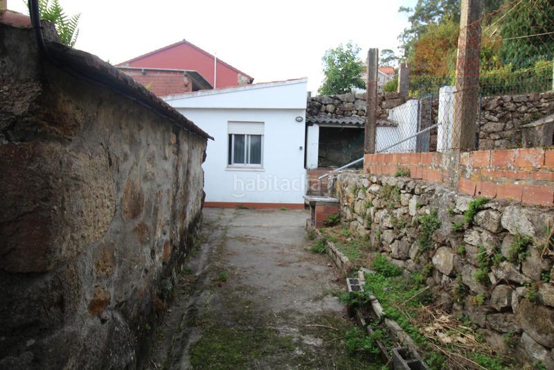 Foto ecb2670f-d1ca-4291-bd75-fa60ce77db0b. Casa  pareada en venta para reformar en Coiro. en Cangas