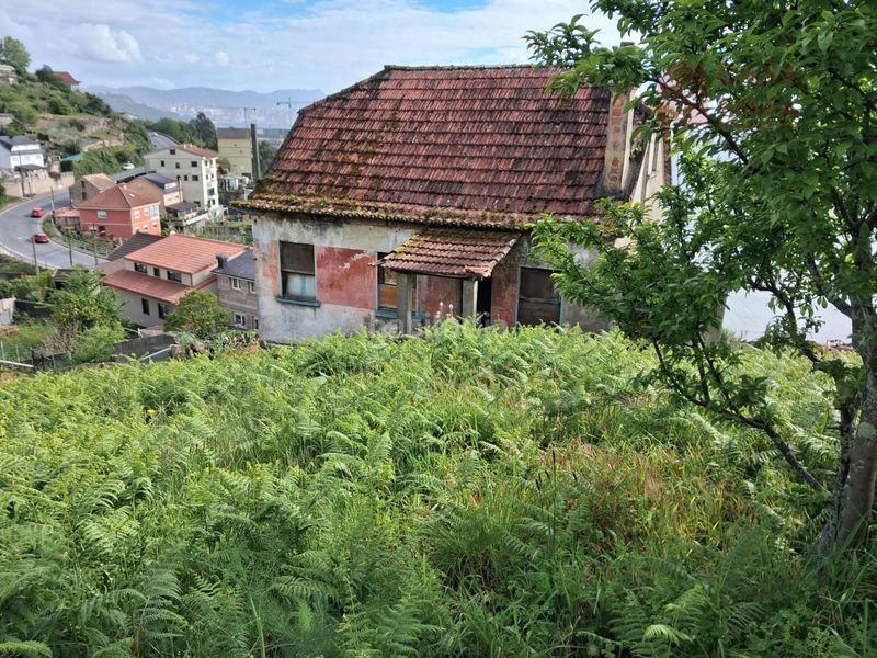 Foto 189c854c-ff1e-4415-850c-0aa83e719570. Casa amb aparcament a Moaña