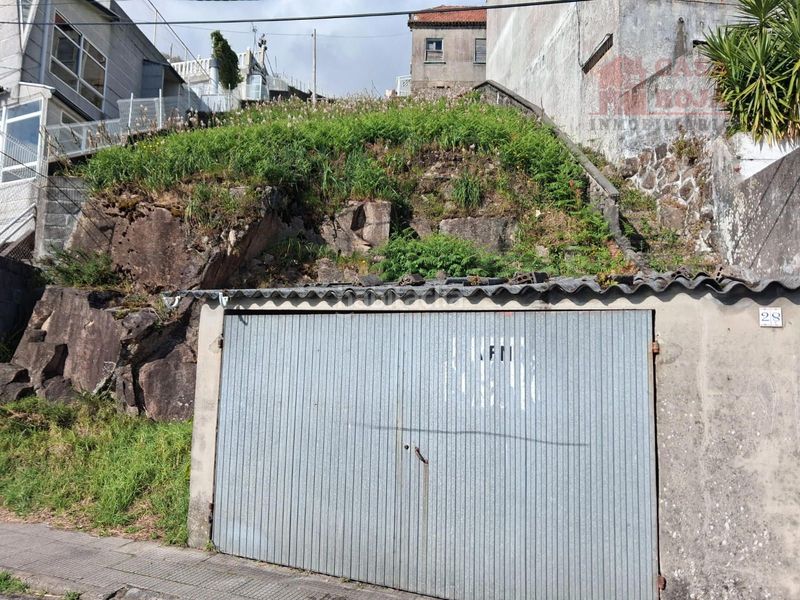 Foto cf1381ef-0b8f-410f-a303-65ce49bd95f0. Casa amb aparcament a Moaña