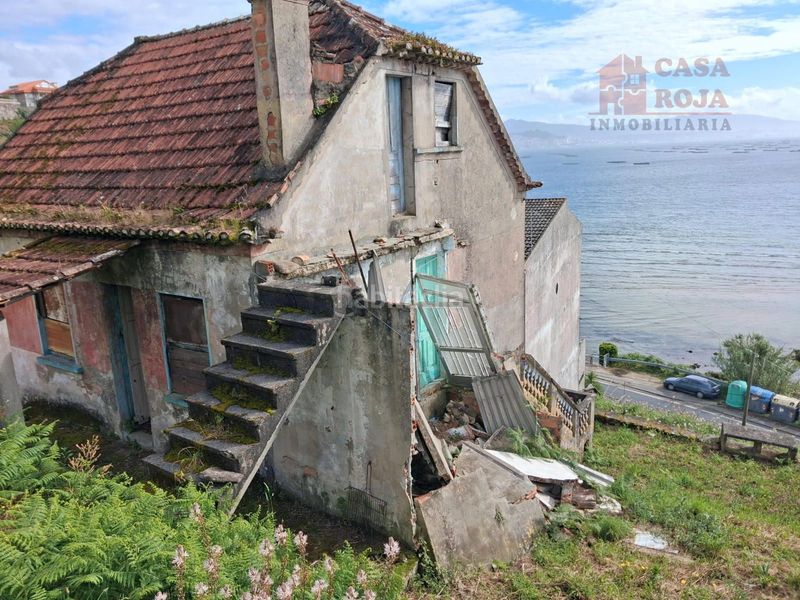 Foto f2cba559-b743-4766-923f-0aa1431dc9e6. Casa amb aparcament a Moaña