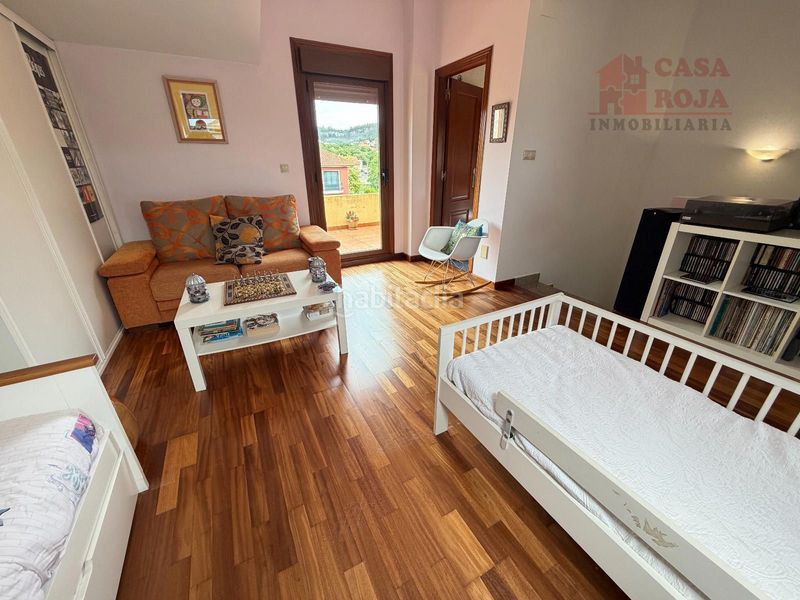 Foto ec861e57-c515-4b54-98cc-058d73755c3c. Casa adossada amb calefacció aparcament a Darbo Cangas