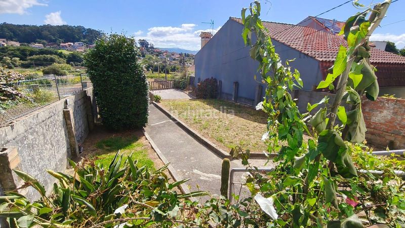 Foto 462dd035-83f7-42c9-a400-bbde92802f0a. Casa amb calefacció aparcament a Darbo Cangas