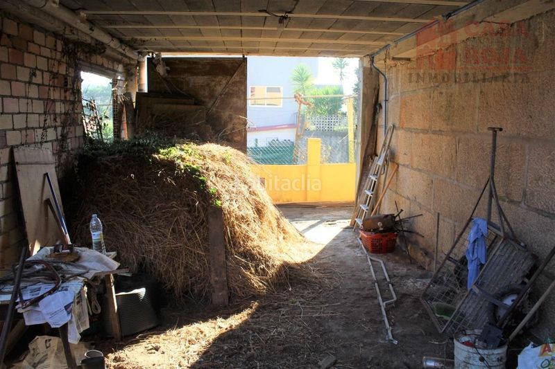 Foto 9f9cf0ad-b080-4444-9c48-a459a9c79df4. Maison avec parking dans Aldán Cangas