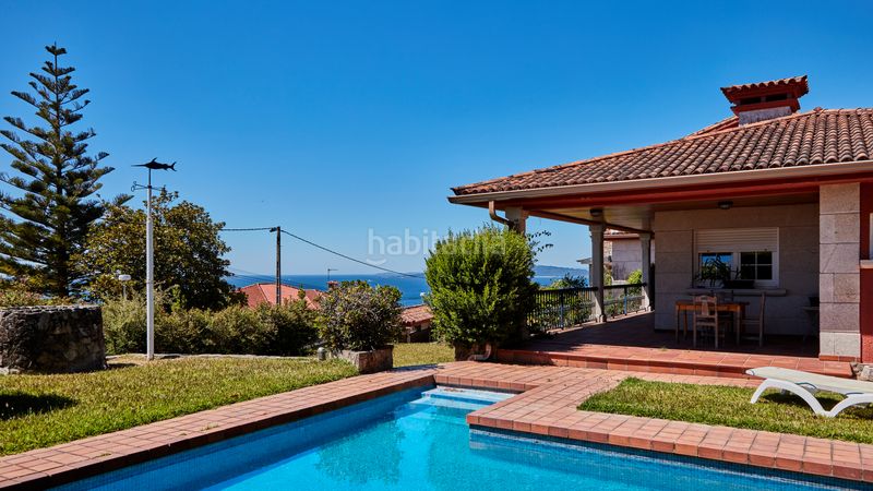 Foto 5bd5c326-b50c-4264-b61f-771951544672. Xalet amb xemeneia calefacció aparcament piscina a Nigrán