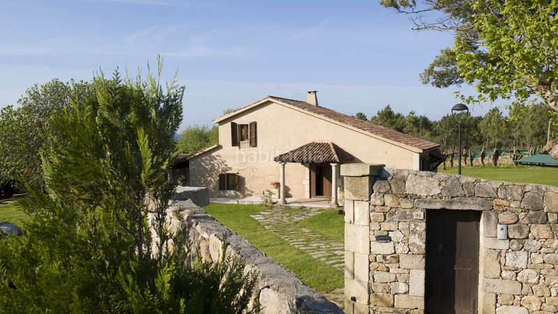 Foto 8c926e33-9f18-4bad-adf7-b55b964612cc. Casa amb xemeneia aparcament a Corrubedo Ribeira