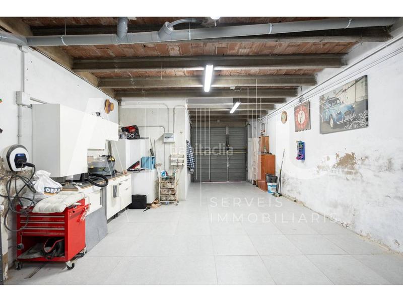 Foto 3f054a1c-c8fb-4d5d-b1a4-0606fdc15302. Casa  en venta en la Creu de Barberàrománica con espectacular garaje, 3 habitaciones y 3 terrazas en Sabadell