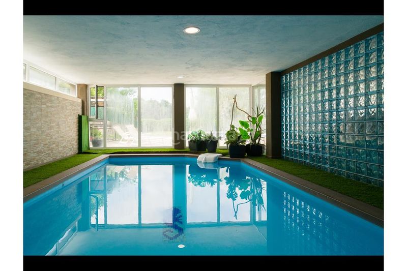 Foto e9dbd257-c428-4d7c-a70f-5d635343456e. Chalet con camino riscaldamento parcheggio piscina in Ames