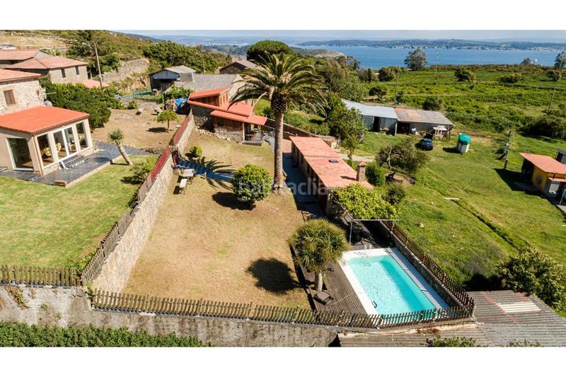 Foto bbf8f1c4-3dcc-4842-abd4-db4ccd42b069. Casa amb xemeneia calefacció aparcament piscina a Ferrol