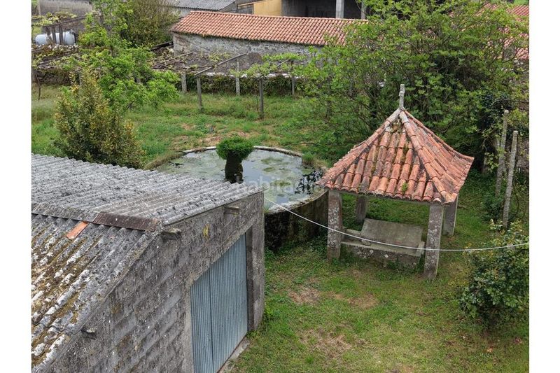 Foto 0a9b754b-1613-4b78-9d34-b8010d3ebb81. Casa amb calefacció aparcament a Silleda