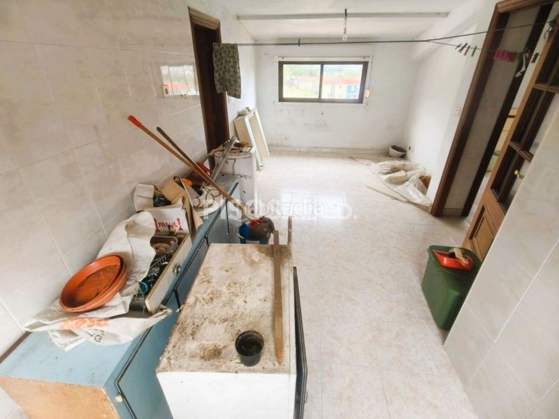 Foto a3cda4a1-ba08-41c4-8d25-63c21782d4ef. Casa amb calefacció aparcament a centro de Culleredo Culleredo
