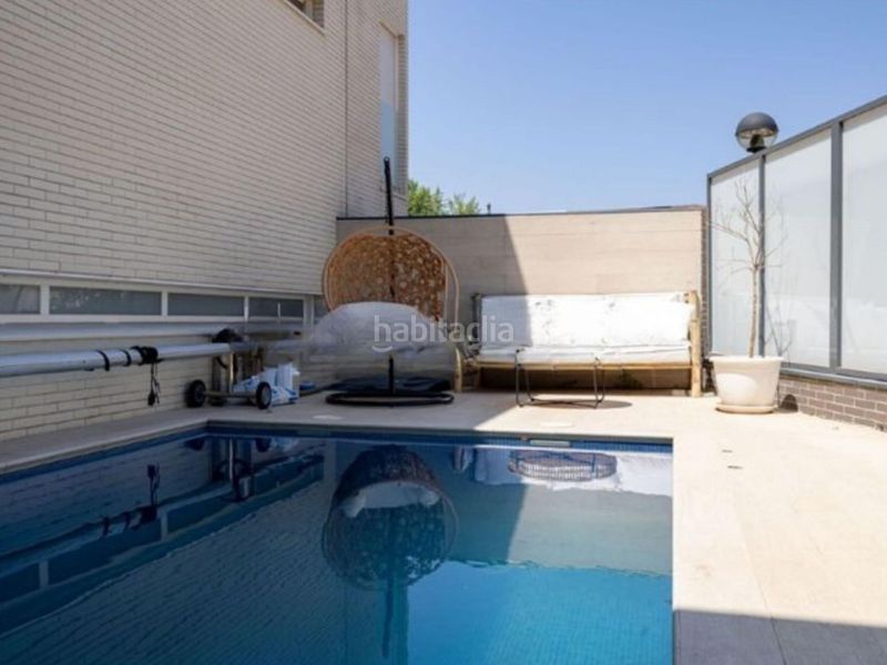 Foto d09d057d-76b9-4d75-affc-36745fc431c9. Casa adossada amb calefacció aparcament piscina a Móstoles