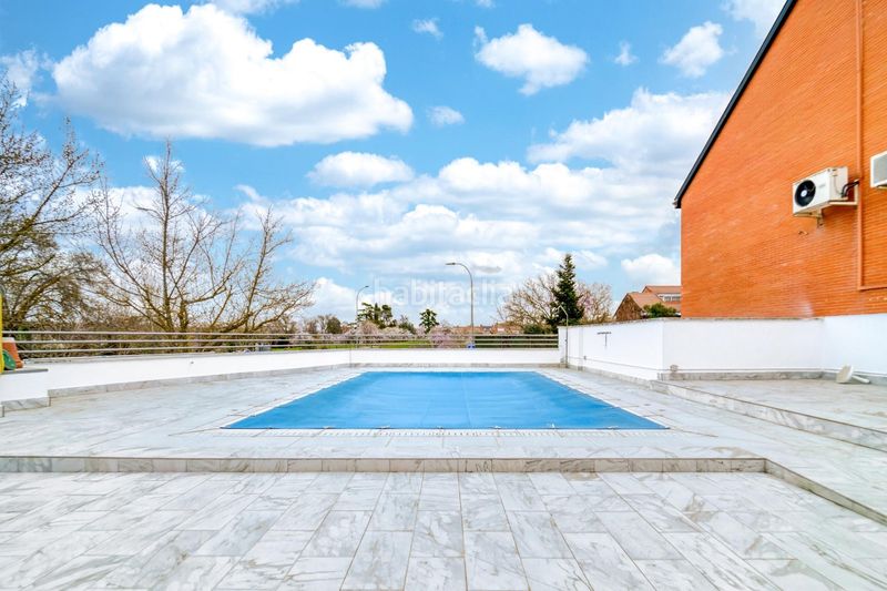 Foto bf9b1212-9a09-4b26-9dfd-7319746ba512. Casa aparellada amb calefacció aparcament piscina a Madrid