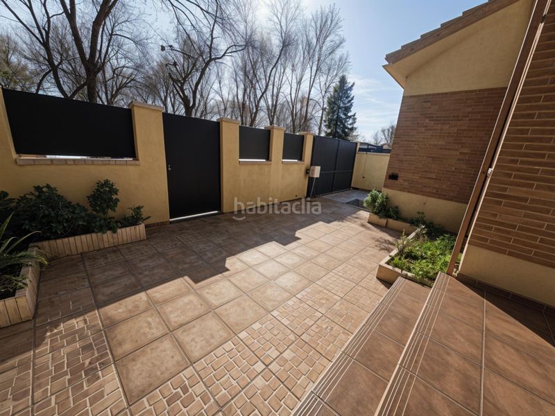 Foto 315eaf28-f9d5-4934-9355-47a1ff93923f. Casa adossada amb calefacció aparcament piscina a Ugena
