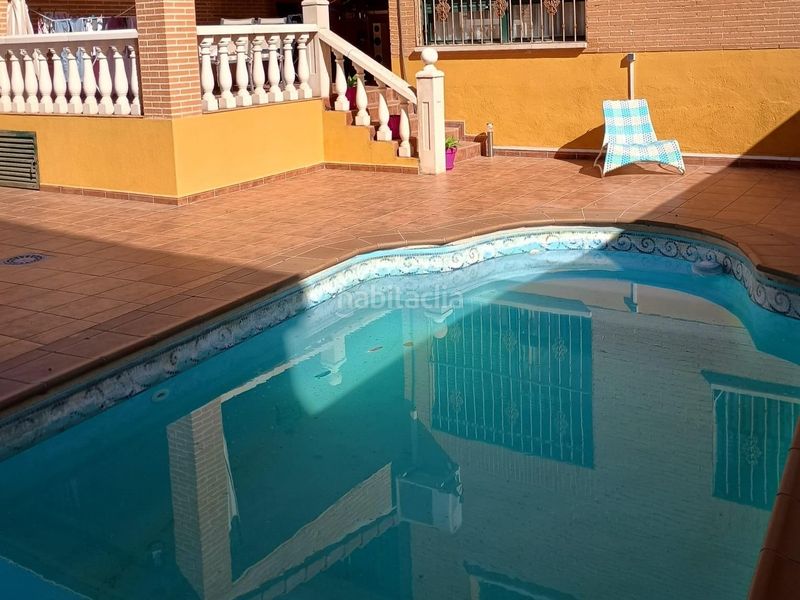 Foto 3c6d96cb-402c-4656-8857-11131837f851. Casa adossada amb calefacció aparcament piscina a Ugena