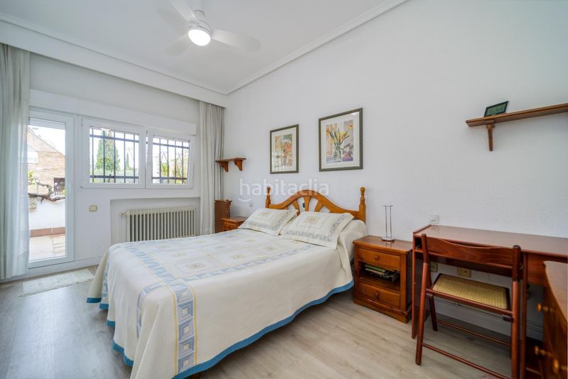 Foto 249a68d4-7c5a-44a3-916e-baa76890205c. Casa pareada en La Florida - El Plantío Madrid