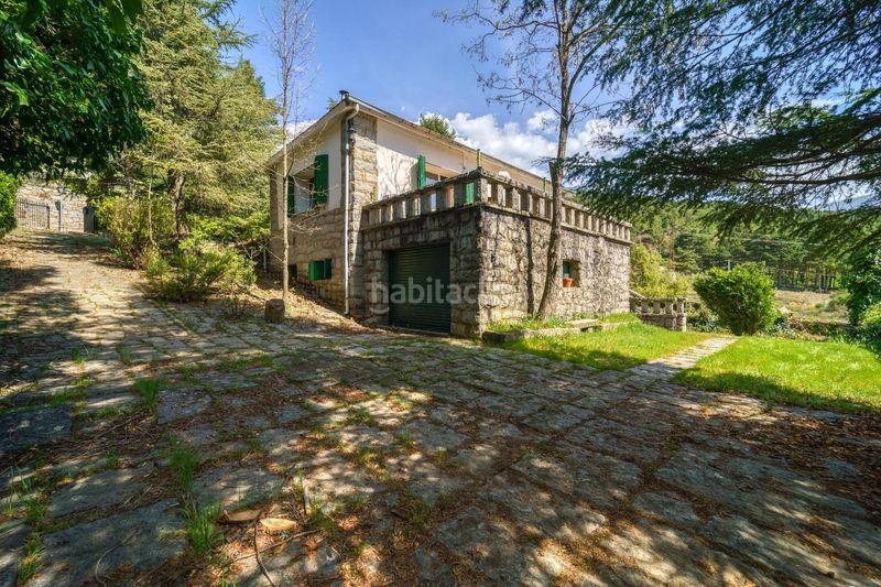 Foto f5b67f66-d787-48c0-ae66-9392fe505ca8. Chalet con parcheggio piscina in Navacerrada