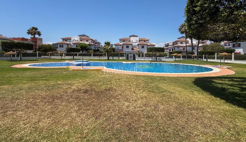Foto ecaf17a6-2a5f-4eb2-b5d8-a3ff73a57a13. Planta baixa amb aparcament piscina a El Playazo Vera