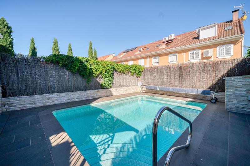 Foto 978131dc-2592-4eb6-945e-5fa3552c7c9f. Casa a schiera con riscaldamento parcheggio piscina in Getafe
