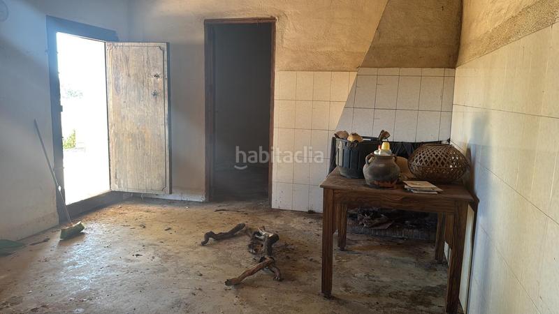 Foto 7f7dd921-0920-4f94-be18-1650c6529254. Terreno residencial parcela rustica con caseta h. en Benlloc