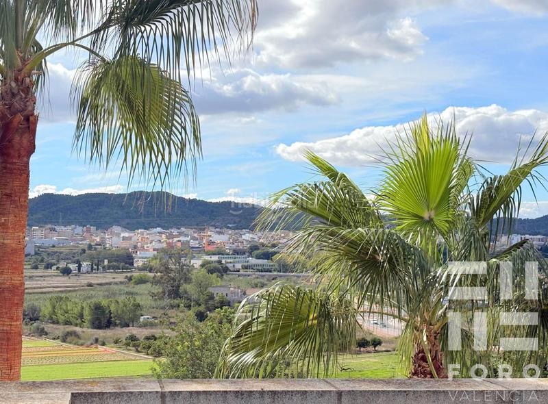 Foto 990bd8bd-24b1-45e4-90c9-18e58b48b4fc. Casa amb aparcament piscina a Montepilar Eliana (l´)