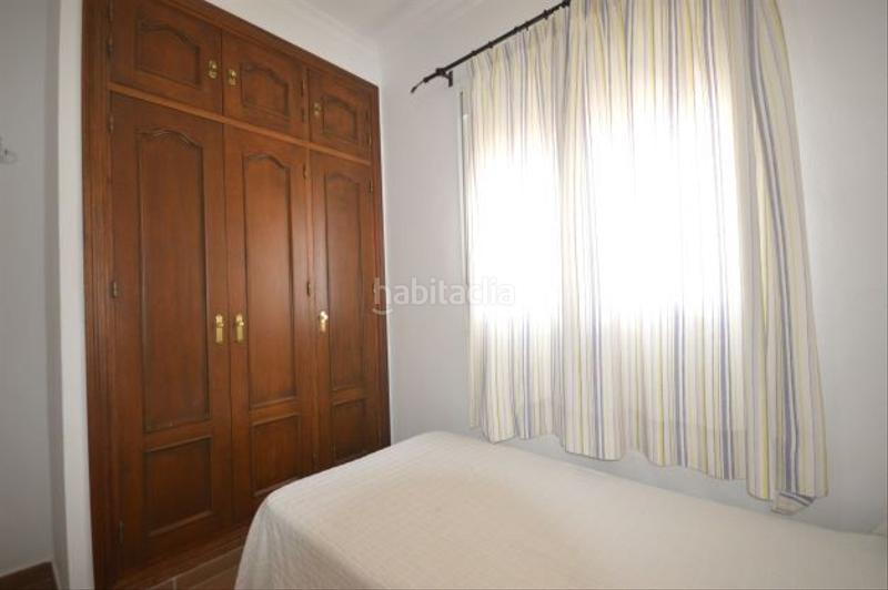 Foto 5f5846d2-e9fe-4d0d-b18f-65171daadfa8. Alquiler casa adosada en calle de sevilla 97 chalet con piscina y jardín en fuente del gallo a 200 metros de la playa. 2 dormitorios, cocina completa. salón - comedor, chime en Conil de la Frontera