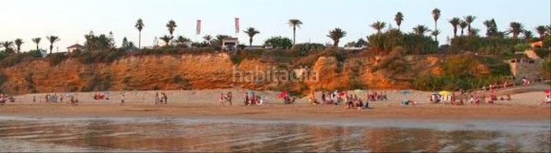Foto 9f454d87-83a5-4d58-a53d-0fb87e172aca. Alquiler casa adosada en calle de sevilla 97 chalet con piscina y jardín en fuente del gallo a 200 metros de la playa. 2 dormitorios, cocina completa. salón - comedor, chime en Conil de la Frontera